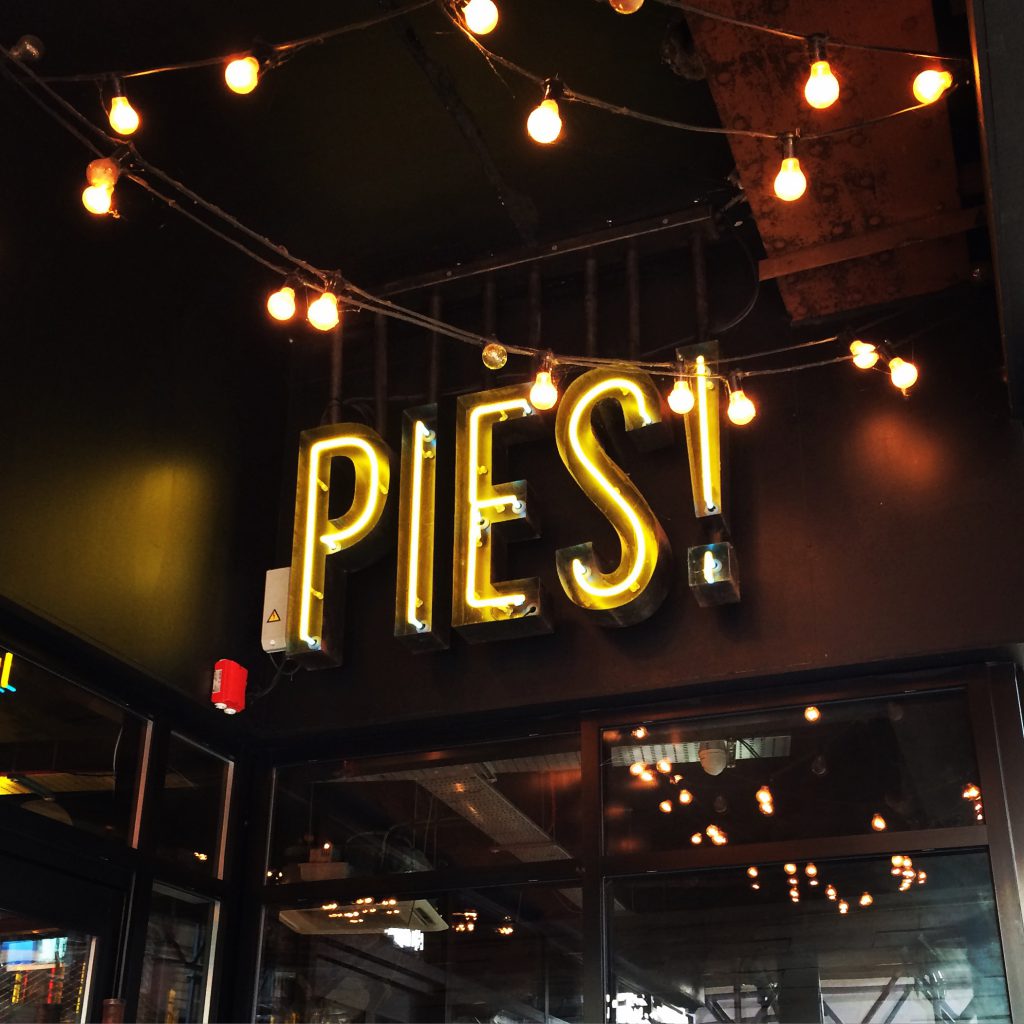 Sign inside restaurant: Pies!