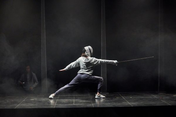 Photo of Tessa Parr in fencing outfit as Hamlet
